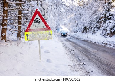 Road Sign Warns Of Ice And Snow At Winter