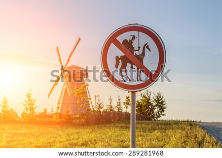 Road sign, which prohibits Don Quixote approach to the mill.