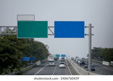 road signs, blue and green road signs. empty sign board with traffic background on highway. - Powered by Shutterstock