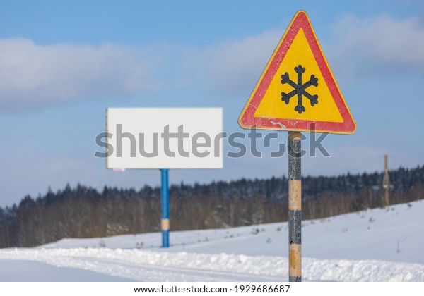 Road signs for drivers cars on the road, on a winter\
sunny day