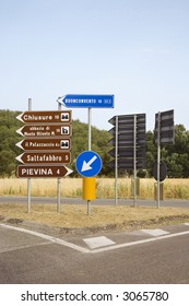 Road Signs Pointing Different Directions, Tuscany.