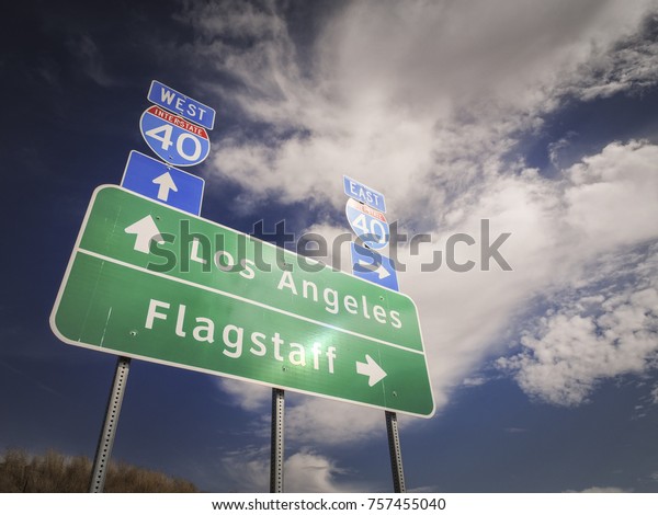 Road signs in a remote place in the US where the\
famous 66 route used to be