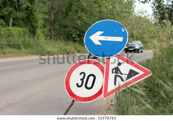 Road signs warning at\
construction