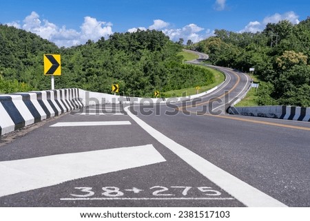The road is similar to the number 3, This road is built on a mountain, past the forest in Nan Province of Thailand. The zigzag road number 3. Good scenery, famous, and have tourists to take pictures.