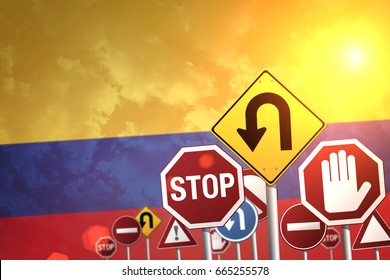 Road Stop Signs On A Background Of Colombia Flag