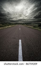 Road And A Stormy Sky.