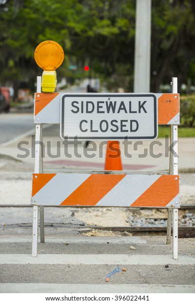 Road street construction zone warning hazard sign\
sidewalk close