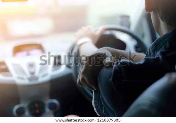 The road to success - a driver traveling on\
a road to the sun(Headache)