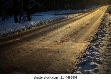 Road Is In Sunlight. Winter Track. Light On Roadway. Sunset Light.