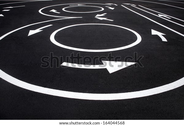 Road surface marking / photography of\
road markings and traffic symbol on surface road\
