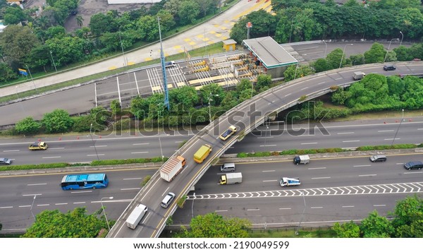 Road system. Road interchanges.\
Multi-level highways. The movement of vehicles on highways in\
different directions. View of multi-level roads from a\
height