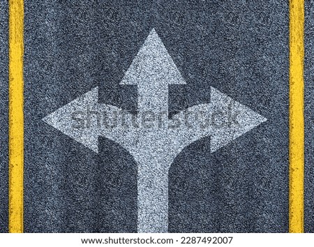 Road with three direction arrow choices top view