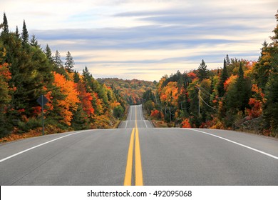 Road through Algonquin Provincial Park in fall, Ontario, Canada