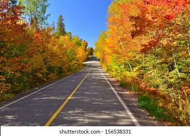 A Road Through The Laurentian Forest In The Fall, Quebec, Canada