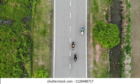 the road from top with motorcycle - Shutterstock ID 1128488717