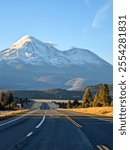 Road towards Mounts Shasta and Shastina in California, United States Highway 97 in Northern California heading South toward a mountain called Shasta volcano, USA