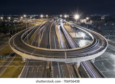 Road Traffic In City At Thailand , U Turn .