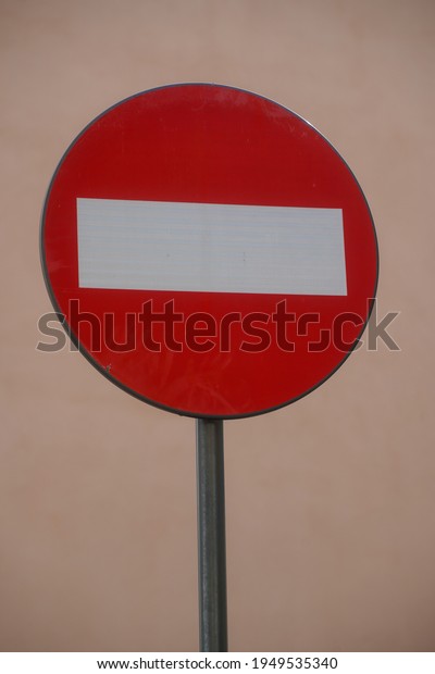 Road traffic sign. Meaning forbidden. Photo during\
the day.