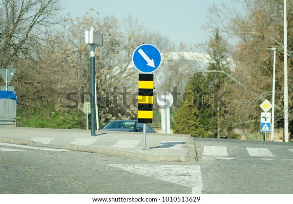 Road traffic sign for only right\
turn direction and caution on the pedestrian\
crosswalk