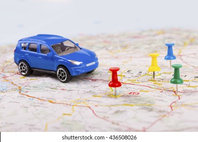 road trip concept, car with destination points on map - Powered by Shutterstock