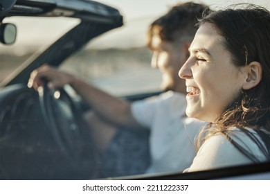 Road Trip Couple, Summer Freedom And Holiday Sunshine, Relax And Adventure In New Zealand. Traveling Woman, Driving Man And Happy Journey, Date Drive And Vacation Together In Convertible Motor Car