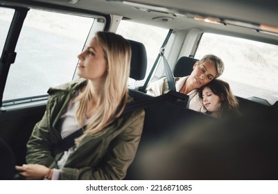 Road Trip, Driving And Family Sleeping In The Car Tired From Adventure, Holiday And Travelling On Road. Travel, Transport And Girl Asleep With Grandmother In Motor Vehicle On Drive Home From Vacation