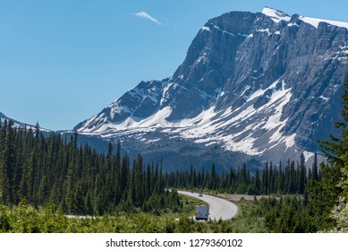 Road Trip With A Great View Of Big Mountain And Blue Sky In Alberta, Canada.