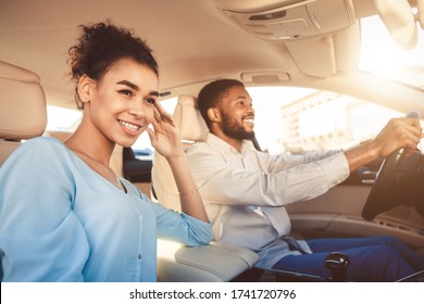 Road Trip. Happy Black Couple Driving Sitting In Car Travelling On Summer Vacation. Selective Focus