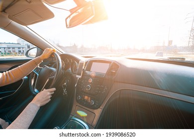 Road Trip. Happy Young Woman Have Fun Travel Inside Car At Sunset. Winter Vacation Concept With Driver