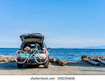 Road Trip To The Ocean In Car With Bike Rack - Esquimalt Lagoon, Colwood, Vancouver Island, British Columbia, Canada  