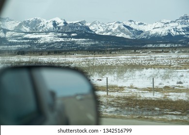 Road Trip Out To The Mountains With A Panorama In The Background And The Wing Mirror Of The Truck In The Foreground 