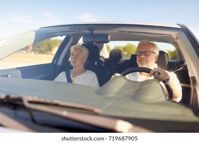 Road Trip, Travel And Old People Concept - Happy Senior Couple Driving In Car