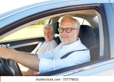 Road Trip, Travel And Old People Concept - Happy Senior Couple Driving In Car