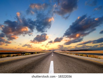 road under dramatic sky - Powered by Shutterstock