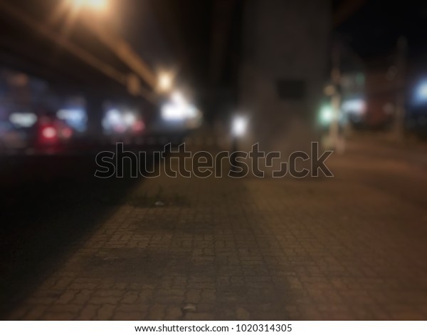 Road under the overpass at night with\
electric light. Bangkok Thailand Wallpaper\
Blurred