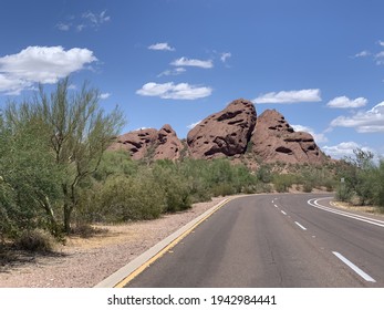 A Road With The View Of Papago Buttes In Phoenix, Arizona