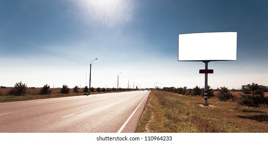 Road In A Village With An Empty Billboard