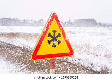 Road Warning Sign Depicting A Snowy Hazard On The Highway