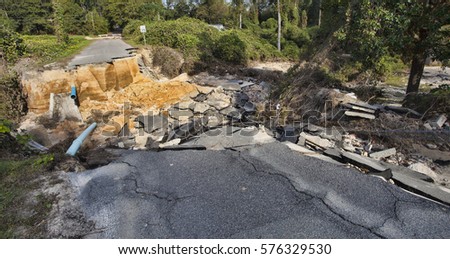Road washed out after Hurricane Matthew in Raeford North Carolina