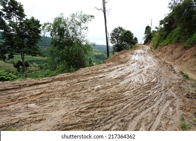 road wet muddy of backcountry countryside