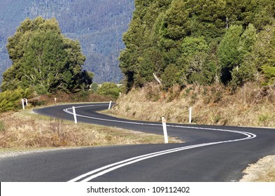 Road Winding Through The East Coast Of Tasmania, Australia