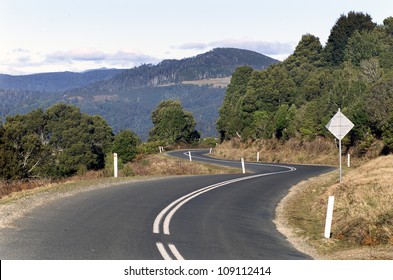 Road Winding Through The East Coast Of Tasmania, Australia