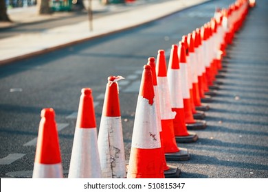 Road Work. Orange Traffic Cones In The Middle Of The Street. 