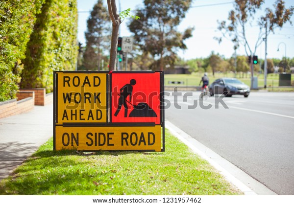Road work
sign. Australia, Melbourne. City street.

