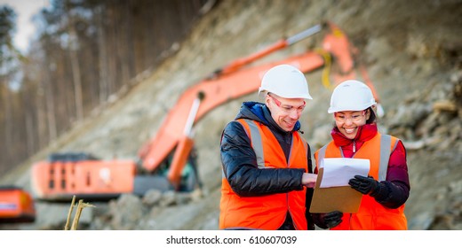 Road Workers Inspecting Construction