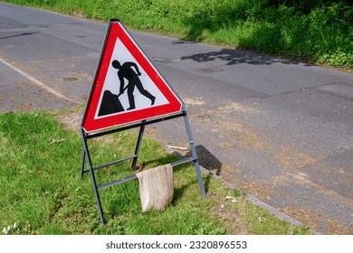 road works ahead sign. road maintenance site on country road.  - Powered by Shutterstock