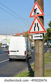 Road Works And Bottleneck Traffic Signs On The Road