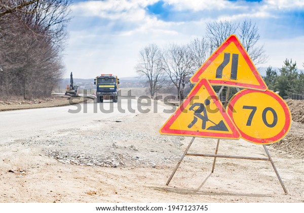 Road works sign\
for construction. Road under construction traffic sign. Traffic,\
warning sign road repairing.\
