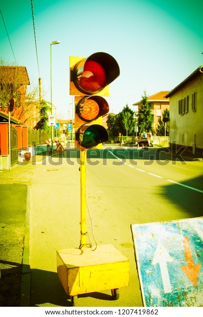 Road\
works with temporary traffic light vintage\
retro