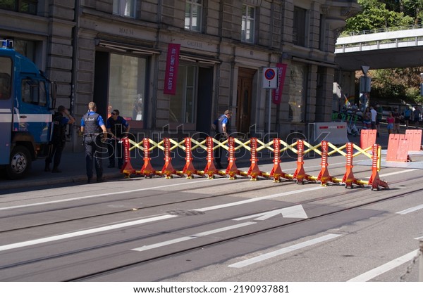 Roadblock by\
police force at main road Rämistrasse at City of Zürich to protect\
Swiss Street Parade on a sunny summer day. Photo taken August 13th,\
2022, Zurich,\
Switzerland.